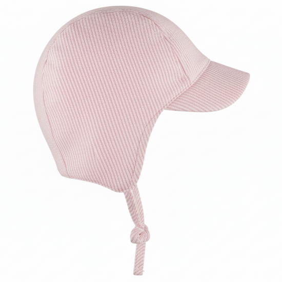 Pink baby hat with a knot on a white background