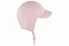 Pink baby hat with a knot on a white background