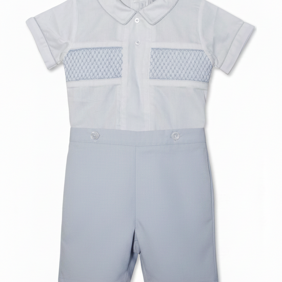 A gray smocked bobbie suit for toddlers, with a Peter Pan collar and short sleeves, featuring elastic leg openings and back buttons.