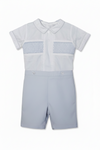 A gray smocked bobbie suit for toddlers, with a Peter Pan collar and short sleeves, featuring elastic leg openings and back buttons.