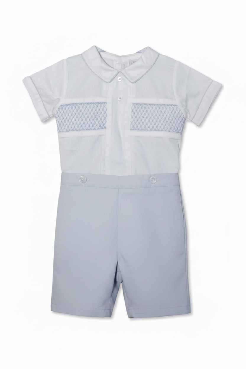 A gray smocked bobbie suit for toddlers, with a Peter Pan collar and short sleeves, featuring elastic leg openings and back buttons.