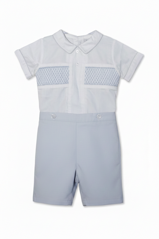 A gray smocked bobbie suit for toddlers, with a Peter Pan collar and short sleeves, featuring elastic leg openings and back buttons.