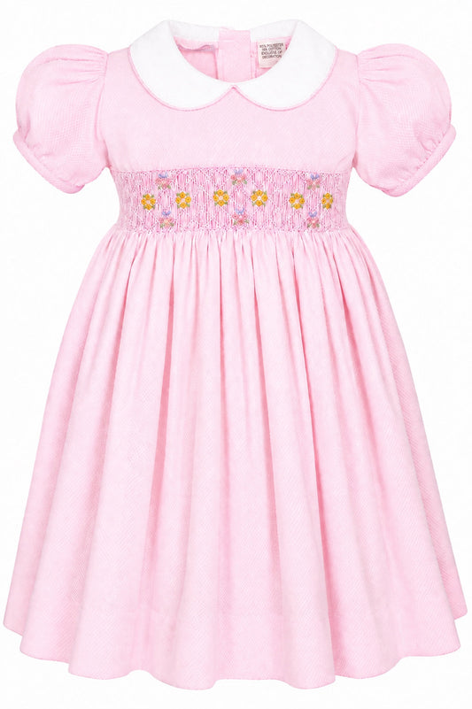 Carriage Boutique pink cotton toddler dress with white collar and smocked yellow floral embroidery detail