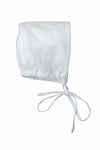 White baby bonnet on a white background
