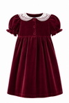 Maroon velvet dress with white lace collar on a white background