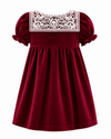 Red dress with lace neckline on a white background
