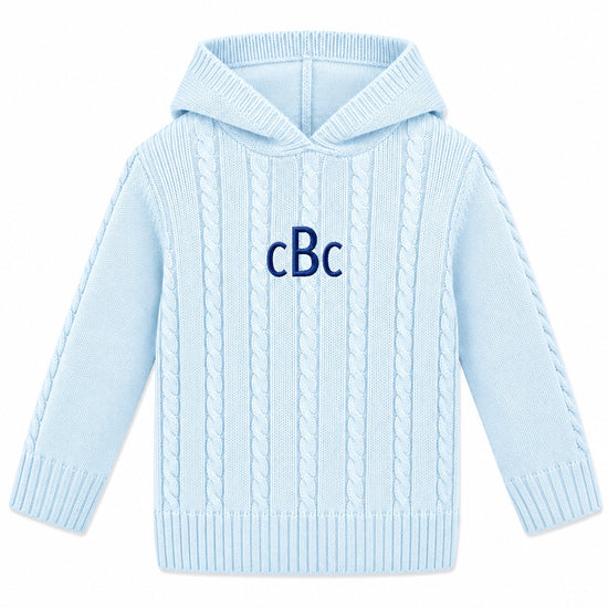 Carriage Boutique baby blue cable-knit hooded sweater with navy blue monogram embroidery on the chest