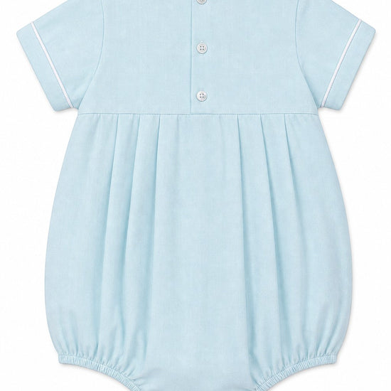 Carriage Boutique baby boy sky blue smocked bubble romper with train embroidery and matching hat.