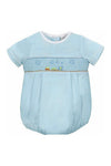Carriage Boutique baby boy sky blue smocked bubble romper with train embroidery and matching hat.