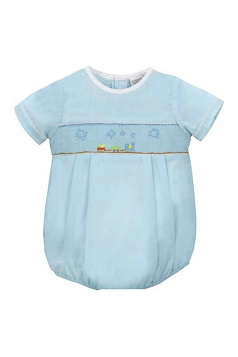Carriage Boutique baby boy sky blue smocked bubble romper with train embroidery and matching hat.