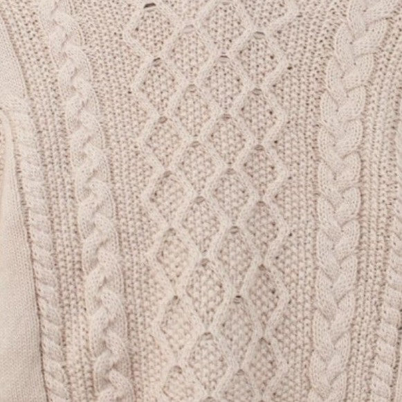 Carriage Boutique beige cotton fisherman knit sweater with intricate cable and diamond pattern texture
