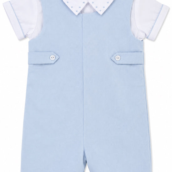 Carriage Boutique baby boy shortall romper in light blue cotton with a white collared shirt and button details.