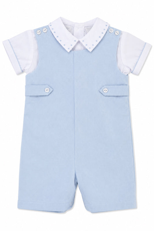 Carriage Boutique baby boy shortall romper in light blue cotton with a white collared shirt and button details.