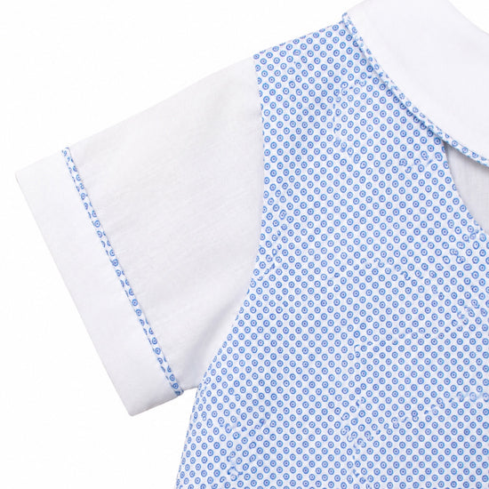 Carriage Boutique baby boy bubble romper in blue and white geometric check pattern with a classic collar