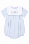 Carriage Boutique baby boy blue cotton romper with white collar and custom monogram embroidery for special occasions.