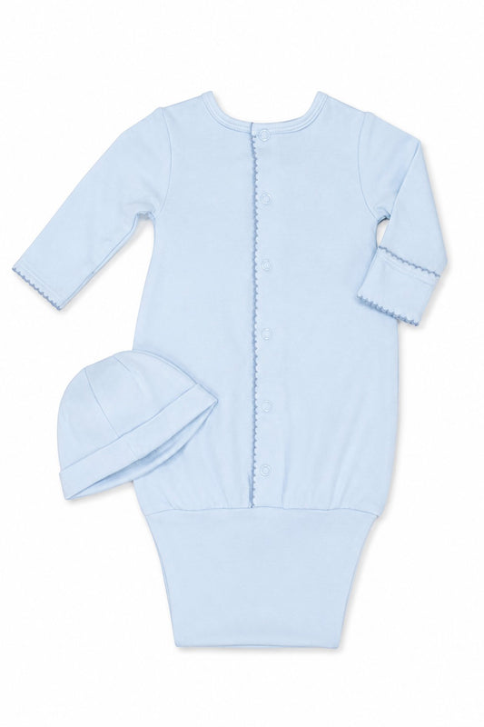 Carriage Boutique blue newborn sleep sack with matching hat, featuring long sleeves and elegant scalloped trim.
