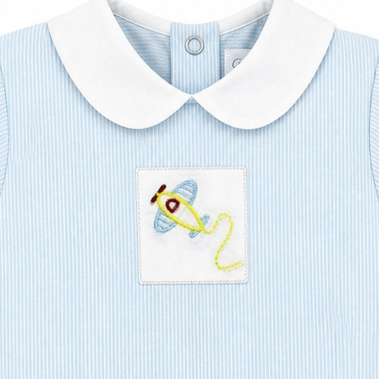 Carriage Boutique baby boy blue pinstripe cotton romper with white Peter Pan collar and embroidered yellow airplane detail.