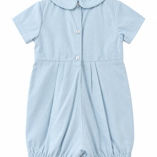 Carriage Boutique light blue pique baby boy romper with a Peter Pan collar and back button closure.