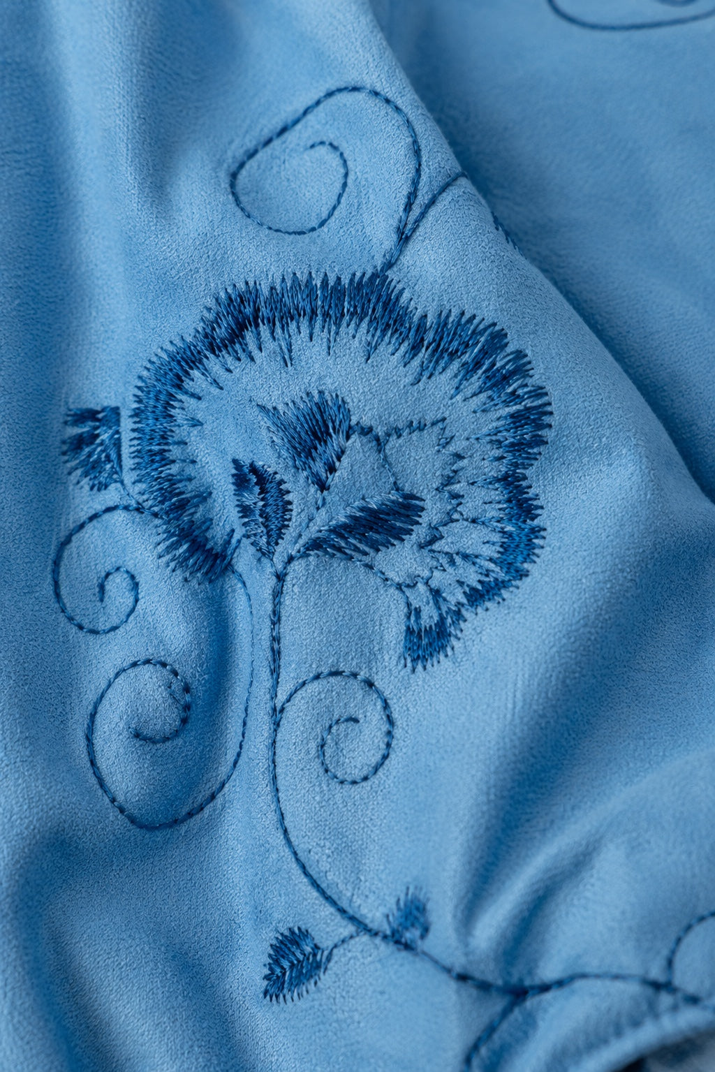 Carriage Boutique blue suede polyester fabric with detailed dark blue floral embroidery for a baby holiday dress
