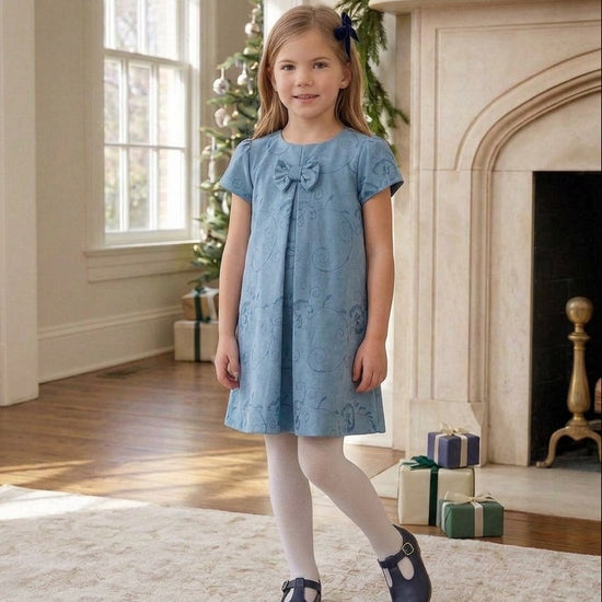 Carriage Boutique blue suede toddler party dress with floral pattern, short sleeves, and a decorative chest ribbon.