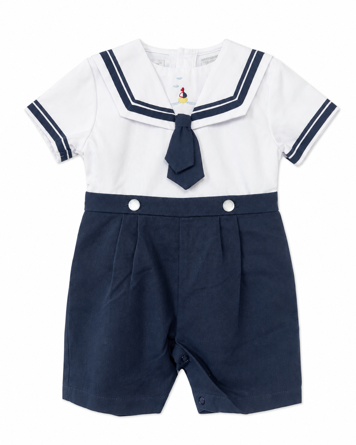 Carriage Boutique boys nautical bobby suit with white cotton shirt, navy sailor collar, tie, and matching shorts.