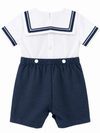 Carriage Boutique boys nautical bobby suit with white shirt, navy sailor collar, and matching navy cotton shorts.