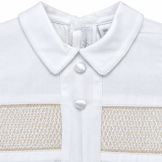 Carriage Boutique white boys bobby suit shirt with hand smocked detailing, Peter Pan collar, and satin buttons.