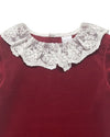 Carriage Boutique burgundy velvet dress featuring an intricate white lace collar for a vintage-inspired look.