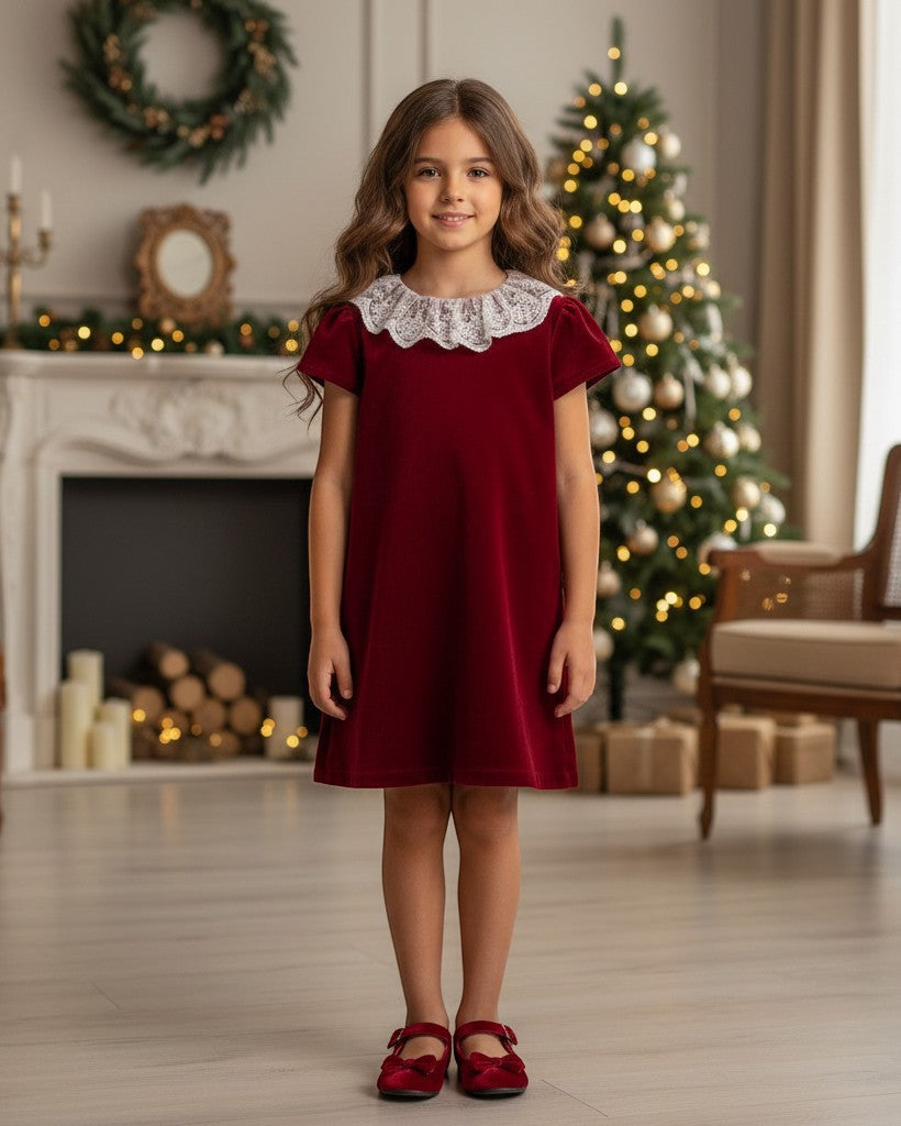 Carriage Boutique toddler burgundy velvet dress featuring a delicate white lace collar, worn by a young girl.