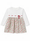 Carriage Boutique long sleeve baby dress with white knit bodice, lace collar, and floral print skirt with red bow.