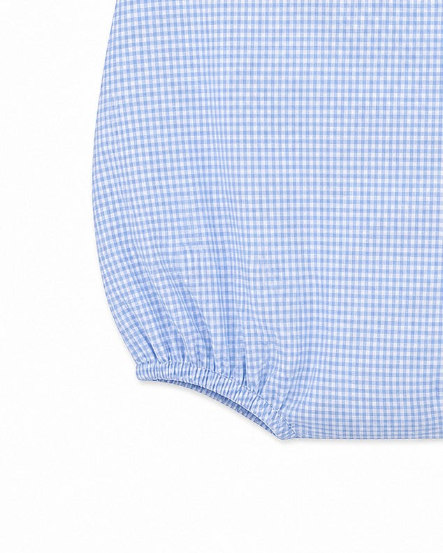 Carriage Boutique blue and white gingham bubble romper with pocket detail. Short sleeves and elastic leg openings.