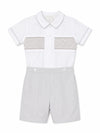 Carriage Boutique gray smocked bobby suit in cotton with a Peter Pan collar and delicate chest embroidery.