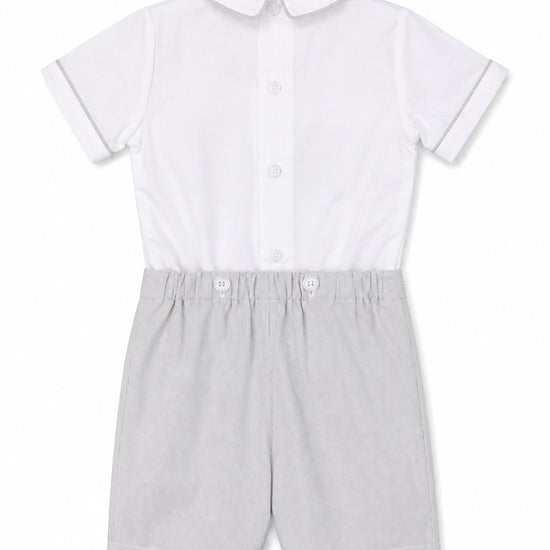 Carriage Boutique gray smocked bobby suit with white Peter Pan collar and button back in soft cotton