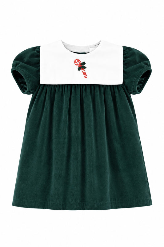 Carriage Boutique dark green corduroy holiday dress for girls with a white bib and candy cane embroidery.