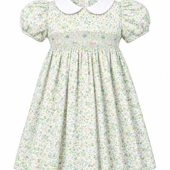 Carriage Boutique toddler girl dress in green floral print with short puff sleeves, white collar, and smocked bodice.