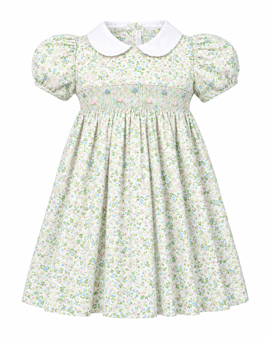 Carriage Boutique toddler girl dress in green floral print with short puff sleeves, white collar, and smocked bodice.
