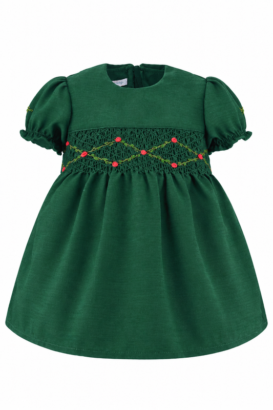 Carriage Boutique green silk baby dress with floral smocking, puffy sleeves, and a Peter Pan collar.