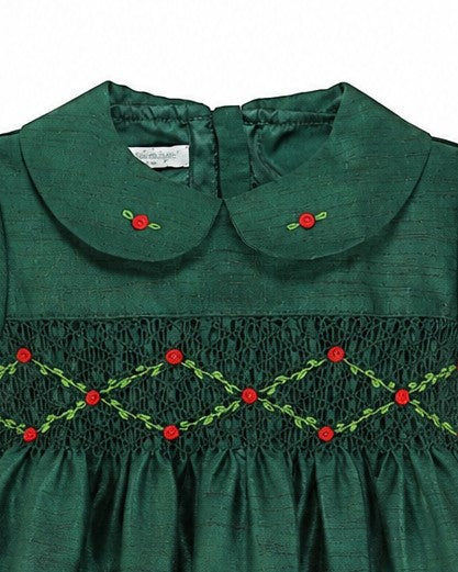 Carriage Boutique green silk toddler dress with floral smocking, Peter Pan collar, and red embroidered rose details.