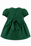 Carriage Boutique green silk toddler dress featuring puffy sleeves, a back zipper, and a decorative waist tie.