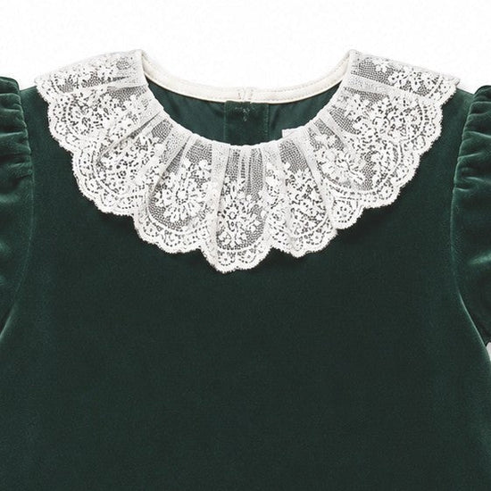 Carriage Boutique toddler green velvet dress featuring a delicate white lace collar and short puff sleeves.