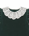 Carriage Boutique toddler green velvet dress featuring a delicate white lace collar and short puff sleeves.