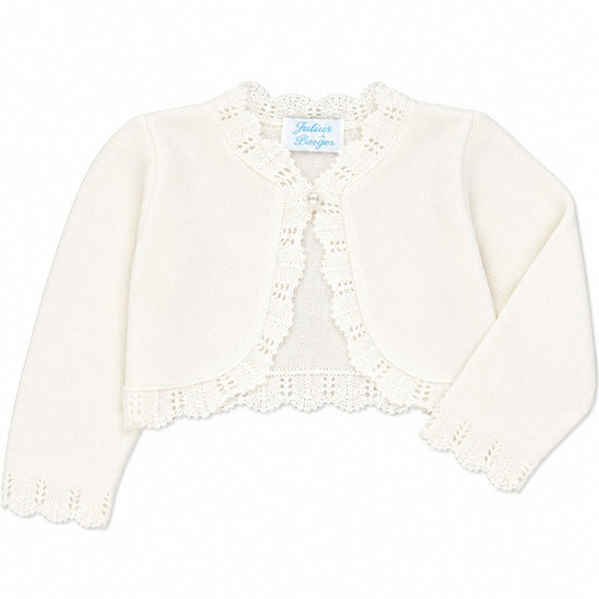 Carriage Boutique ivory cotton bolero shrug for baby girls featuring delicate scalloped edges and a single button.