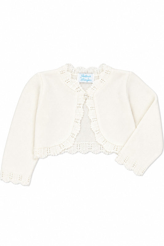 Carriage Boutique ivory cotton bolero shrug for toddler girls featuring delicate scalloped edges and a single button.