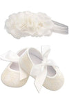 Carriage Boutique ivory lace baby girl baptism shoes with ribbon bows and matching floral headband with pearls.
