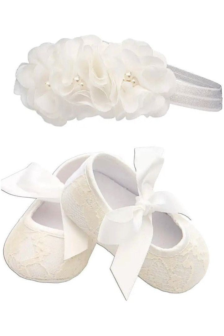 Carriage Boutique ivory lace baby girl baptism shoes with ribbon bows and matching floral headband with pearls.
