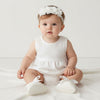 Carriage Boutique ivory lace baby girl baptism shoes with ribbon bows and matching floral headband with pearls.