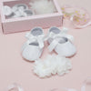 Carriage Boutique ivory lace baby girl baptism shoes with satin bows and matching flower headband with pearls.