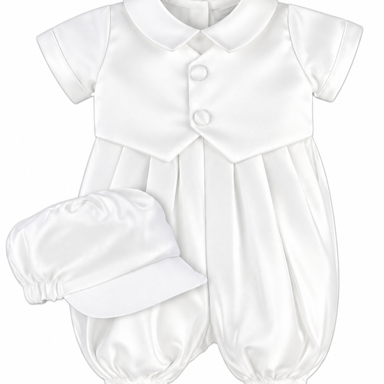 Carriage Boutique ivory satin christening romper with a vested design, peter pan collar, and matching baby boy hat.