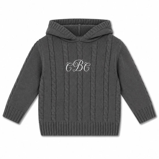 Carriage Boutique dark grey cable-knit baby boy hoodie with white monogram embroidery on the chest