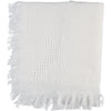 Carriage Boutique Julius Berger white baby blanket with woven cross pattern and delicate fringe trim.